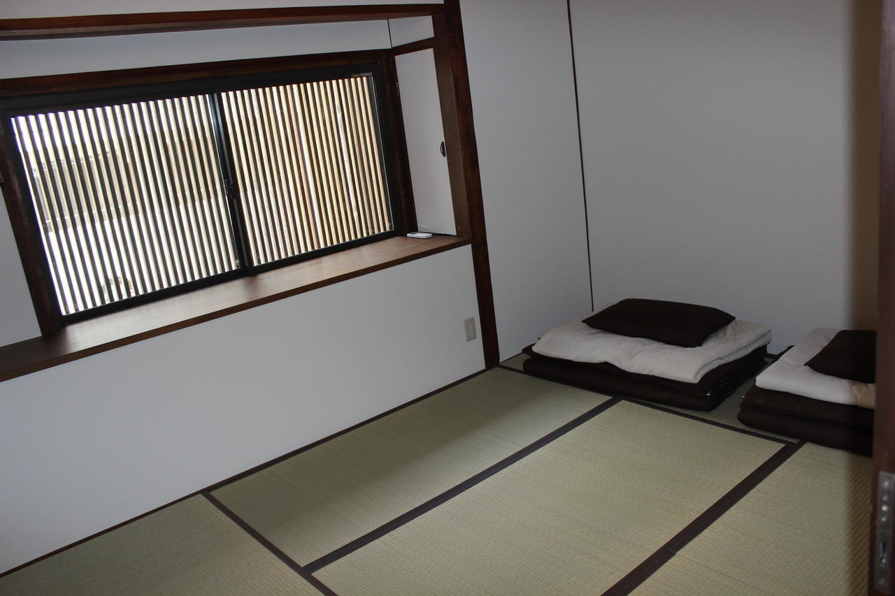 Tenma Itoya Guest House Osaca Quarto foto