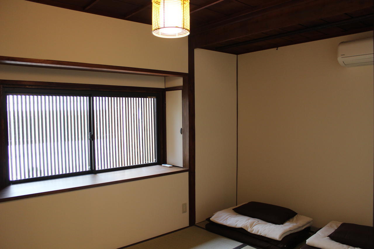 Tenma Itoya Guest House Osaca Quarto foto